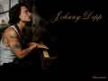 Обои > Джонни Депп играет на рояле